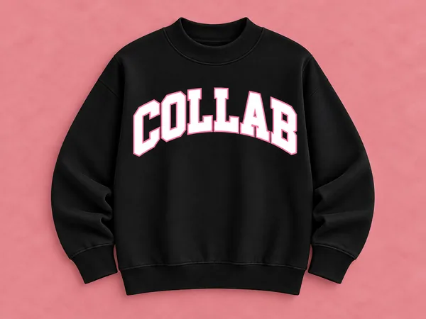 Black COLLAB Mock Neck Sweatshirt Black COLLAB Mock Neck Sweatshirt, black mockneck sweatshirt with arched white COLLAB varsity lettering outlined in light pink